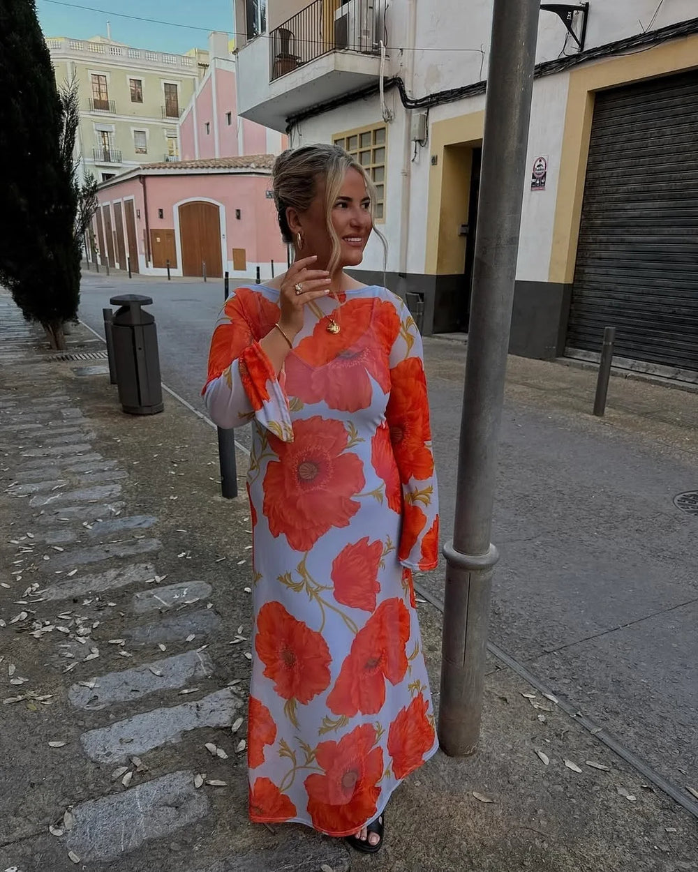 close view of crew neckline and waist on poppy floral dress