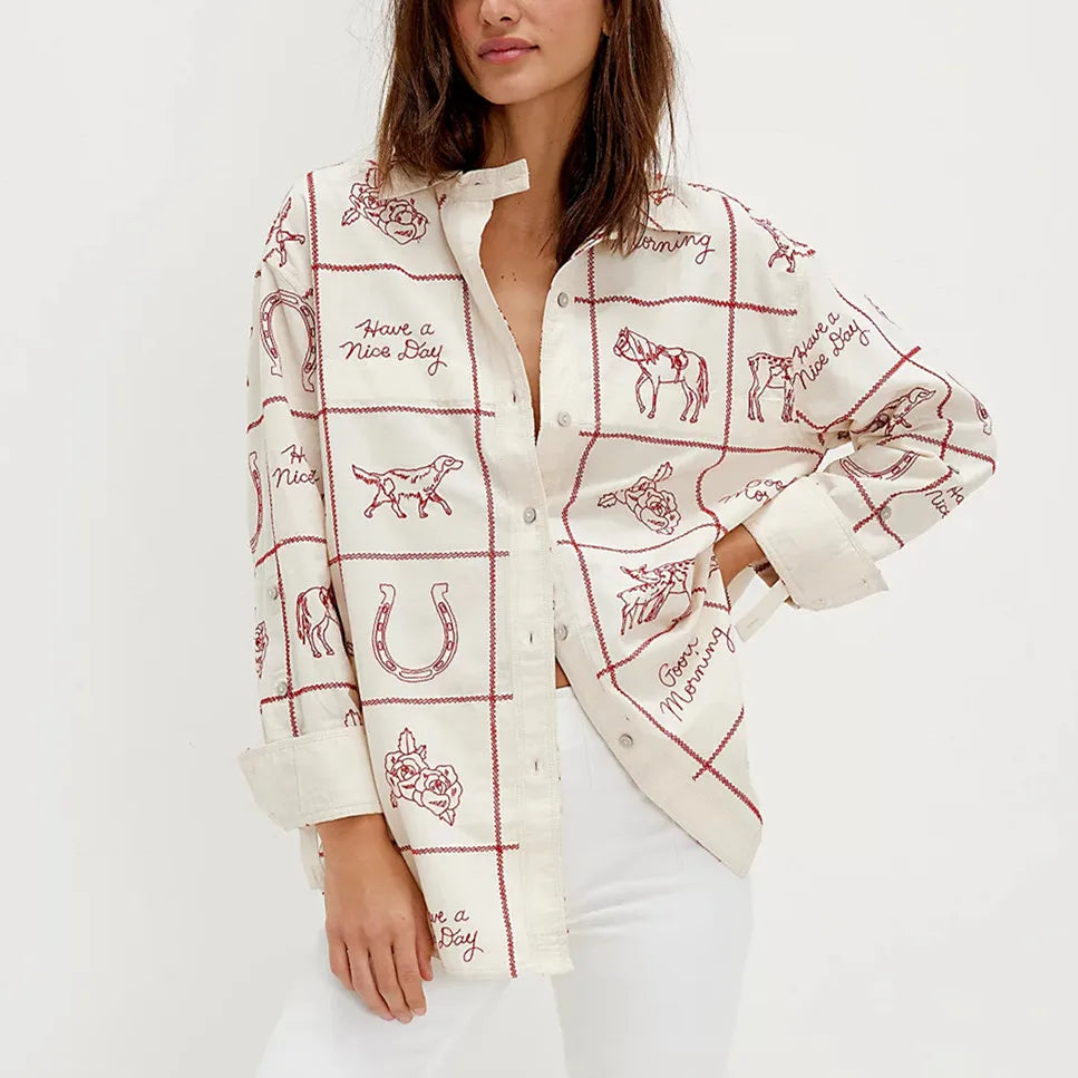 Blue line art patterned shirt paired with high-rise jeans for city vibes