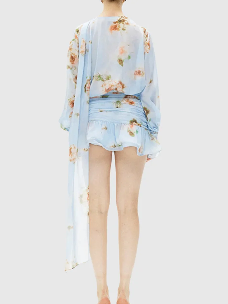 Sleeved lightweight dress with ruffle detailing for warm weather