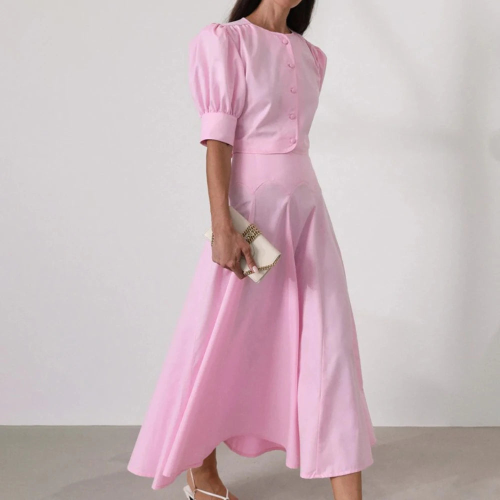 Blush pink two-piece midi dress with flowing A-line skirt for spring events