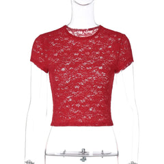Bold red lace crop top styled for holidays, clubwear, and social outings