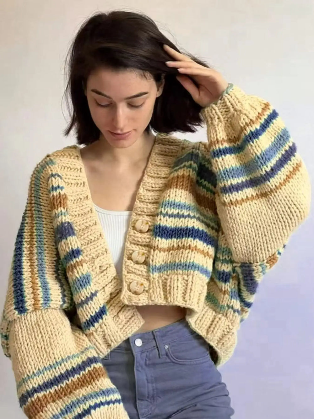 Bold statement cardigan with batwing sleeves for Pinterest-inspired outfits