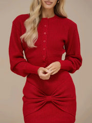 Detail view of the red mini skirt highlighting the gathered bow-twist feature at the front for a sculpted, flattering look.