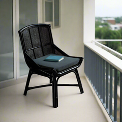 Breathable woven rattan dining chair in black frame
