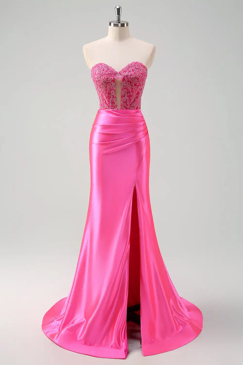 Full-length view of a satin sweetheart gown styled for a formal event