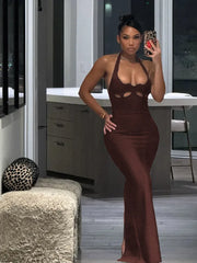 Front view highlighting the halter neckline and sculpted bodice on a brown bodycon maxi dress styled for an evening look.