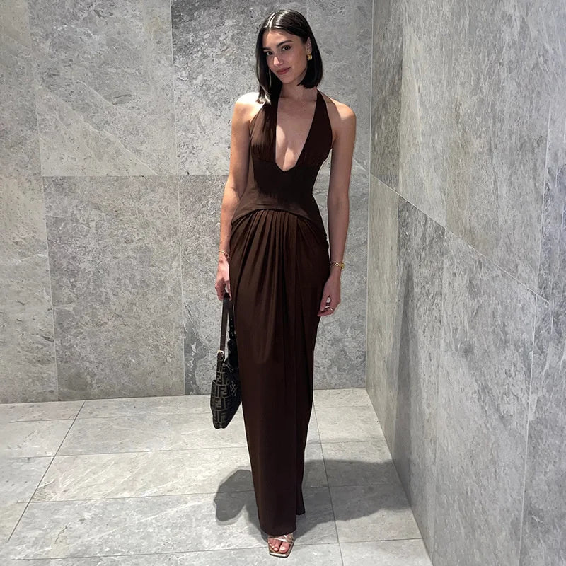 Close-up of the deep V neckline and corset-style seam shaping, showing the smooth fabric finish and clean, sculpted fit.