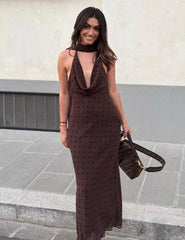 Brown polka dot cowl neck backless dress styled for fall parties