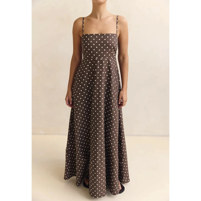 Close look at the square neckline and thin straps, showing the smocked bodice shaping and clean top edge finish.