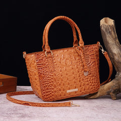 Textured leather shoulder bag with adjustable strap
