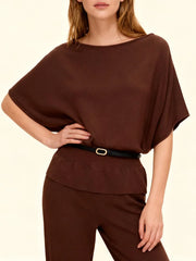 Close-up of sash neckline and belt on brown knit tunic
