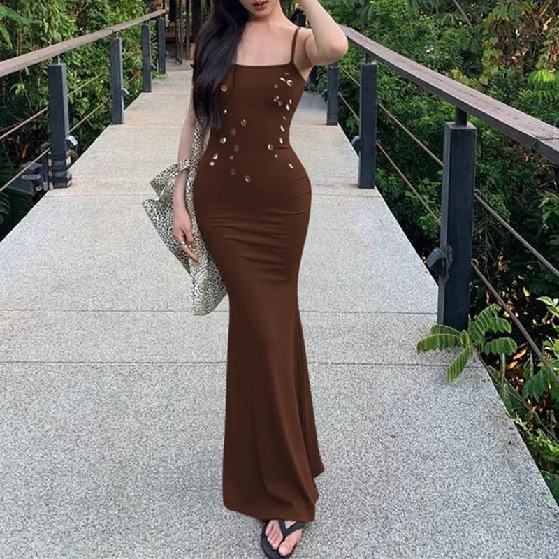 Brown spaghetti strap maxi dress styled for outdoor garden parties