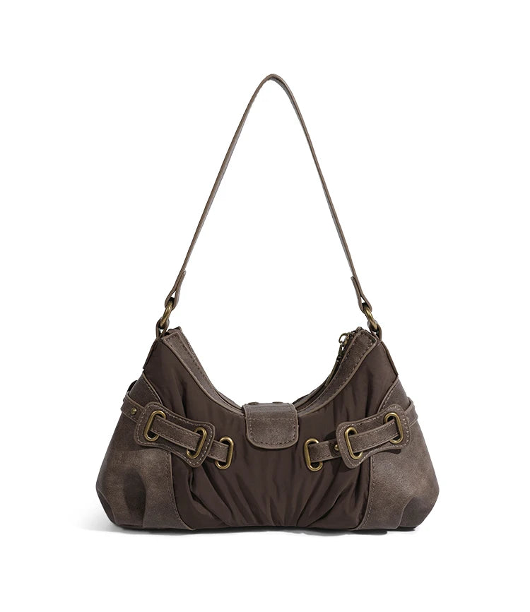 Soft brown hobo handbag with gold-tone buckle accents and single strap on a white background