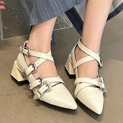 “Fashionable buckle strap heels styled for office or casual daywear”


