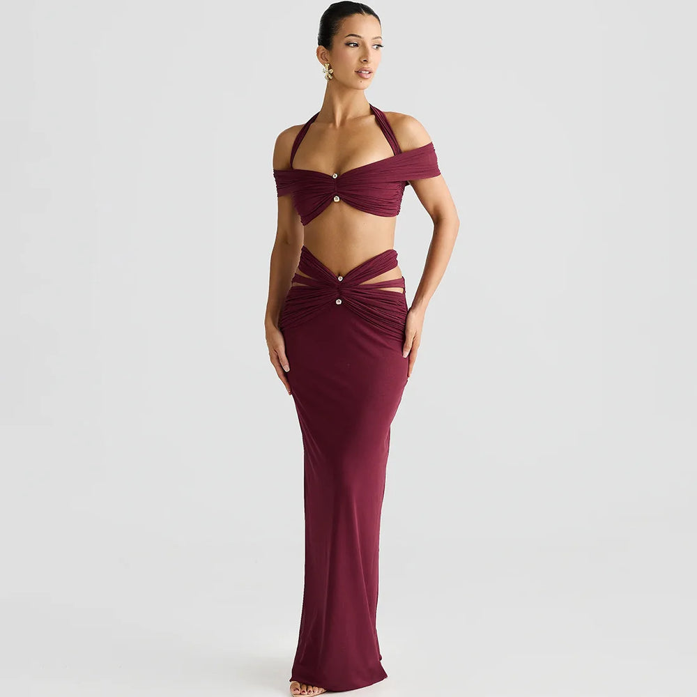 side angle showing high waist bodycon maxi skirt in wine tone