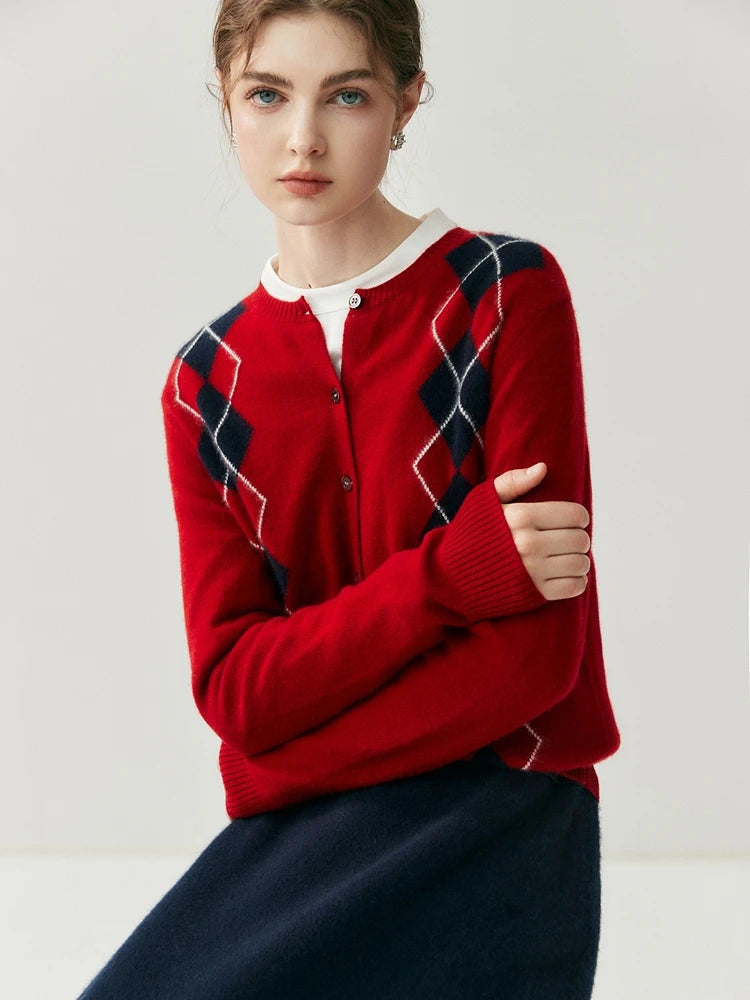 Front view highlighting the button closure and balanced argyle pattern across the cardigan
