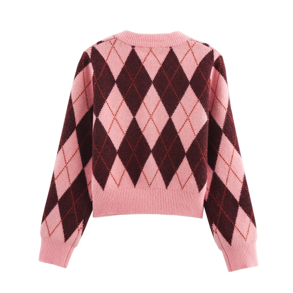 Full view of the cardigan highlighting the diamond motif and long sleeve proportions