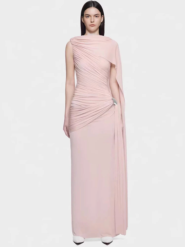 Close-up of the asymmetrical draping across the bodice, showing sculpted folds and a smooth finish that contours the waist.