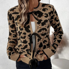 The loose fit of the sweater, highlighting its comfortable regular sleeves.