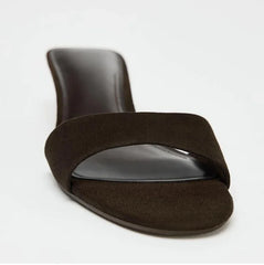 Front view of slip-on brown wedge heel sandals