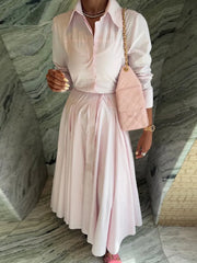 The two-piece outfit worn as a stylish and comfortable beach look.

