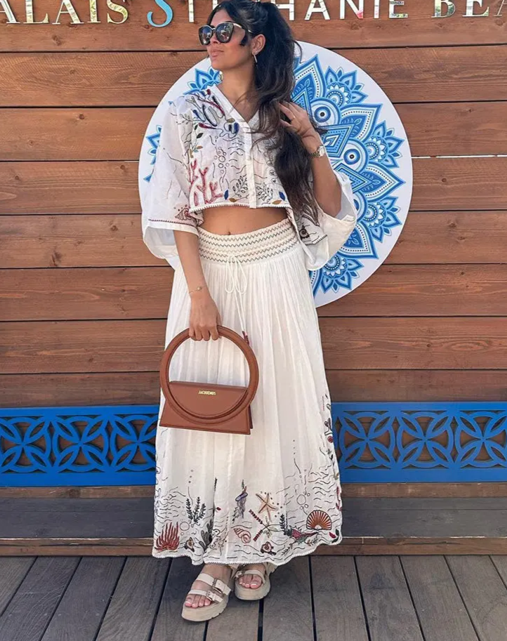 Embroidered V-neck top and tiered mini skirt set with paisley and floral prints