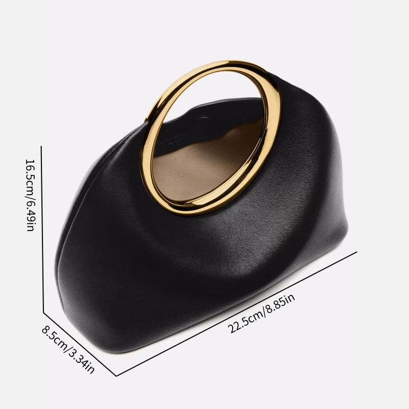 Chic black hobo clutch featured in outfit accessory photos

