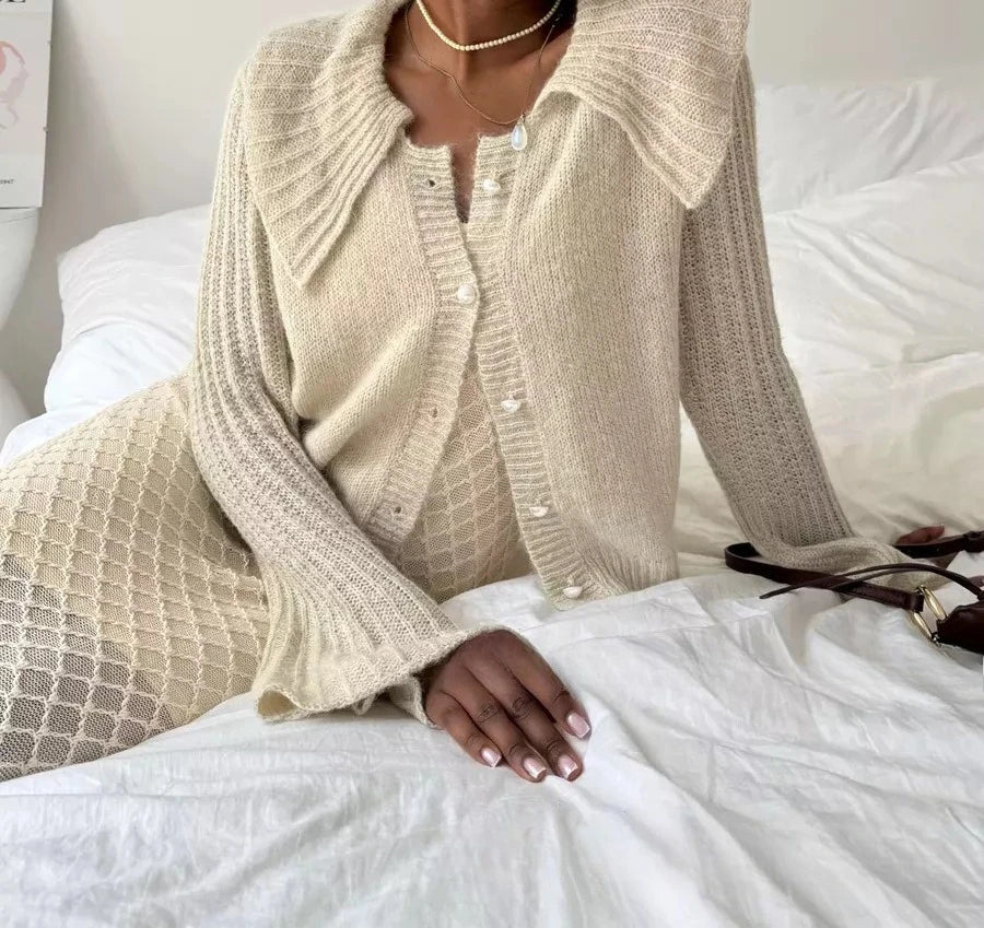 Chic white cardigan in Parisian-inspired style, perfect for office and brunch