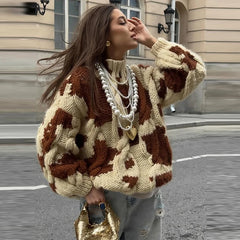 Chunky cow pattern knit sweater styled for city autumn streetwear