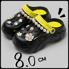Top view of casual EVA clogs with floral decor and pearl detail