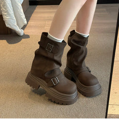 Close-up of chunky sole slip-on ankle boots for women