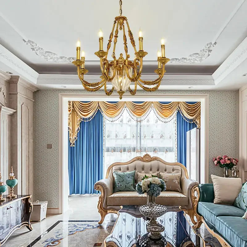 Classic brass chandelier with six candle-style lights on a polished finish