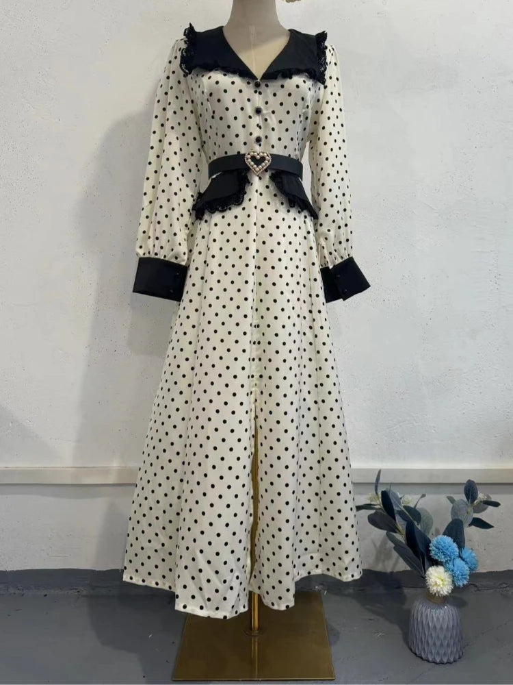 Classic polka dot midi shown for chic spring brunch and desk-to-dinner style