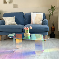 “Close-up of color-shifting acrylic tabletop with smooth curved edges”

