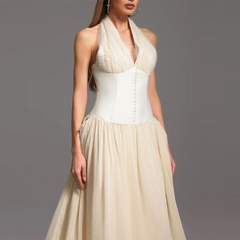 Close-up of halter neckline and corset waist on flowing summer dress