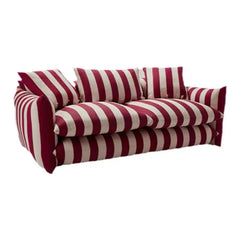 “Close-up of striped sofa fabric and pine wood arm detailing”

