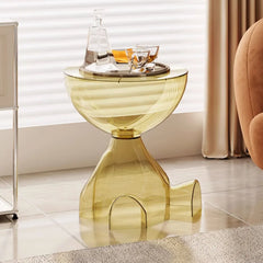 close-up of flat top plastic accent table with translucent body
