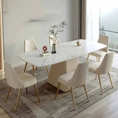 “Close-up of marble-look tabletop and sculptural gold-accent base”