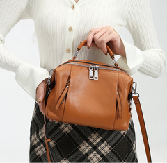 Leather shoulder and crossbody bag with adjustable strap and structured shape