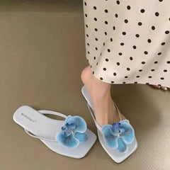 Colorful outdoor summer sandals with floral accents for vacation