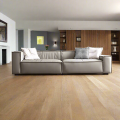 Modern Design Wooden Frame Leather Bedroom/Living Room Sofa in a bright living room with a wooden floor.
