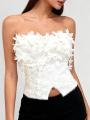 Side profile highlighting the structured corset shape and cropped length of the strapless top