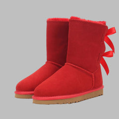 Red cow leather snow boots with bow detail
