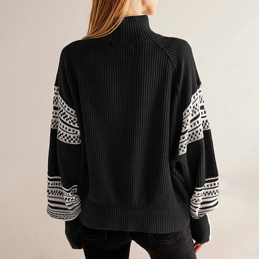 Detail view of the crew neckline and shoulder line, highlighting the ribbed trim and smooth knit texture for a polished look.