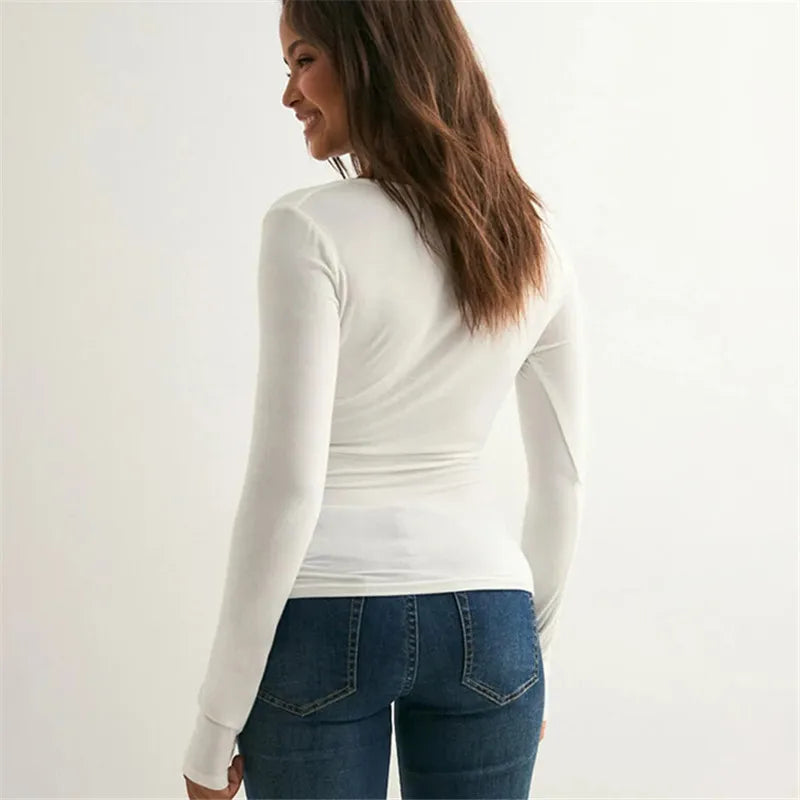 Crisp v-neck crossover top for versatile layering and campus looks