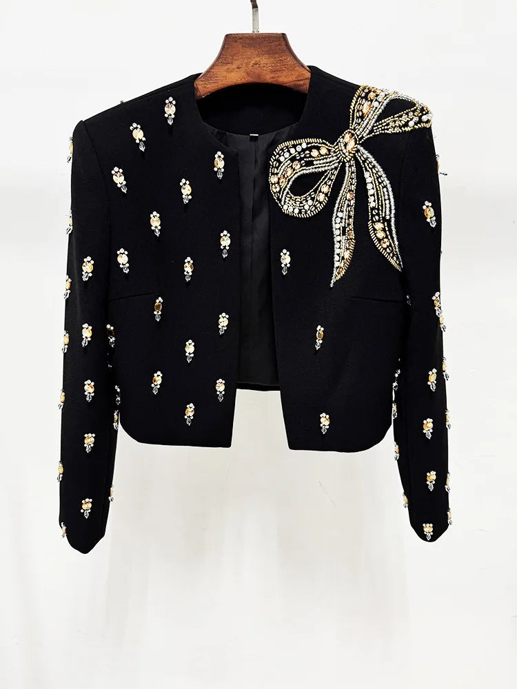 Full-length look showing the straight, ankle-grazing fall of the maxi dress, finished with subtle texture for an elevated occasion outfit.