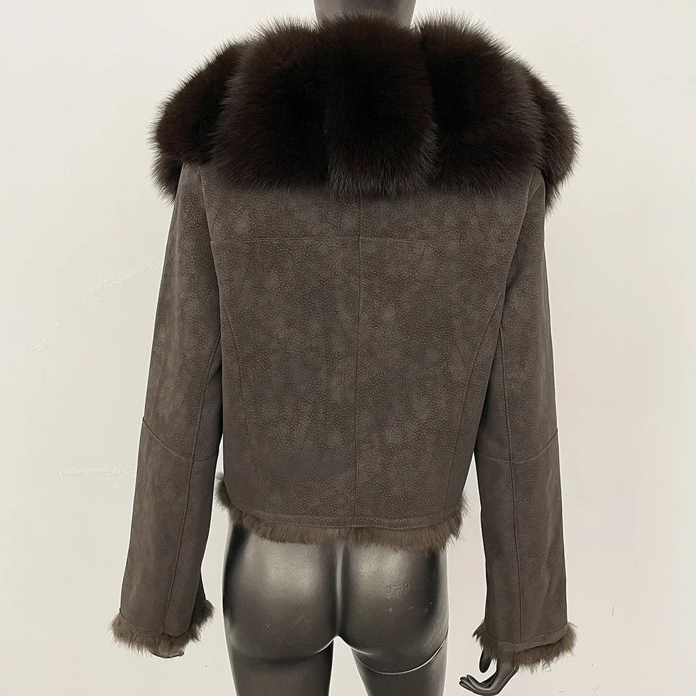 Short suede jacket shown straight on, emphasizing wide-waisted cut and clean cropped proportions