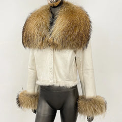 Cropped suede jacket shown on a mannequin, highlighting the plush fur collar and clean structured front