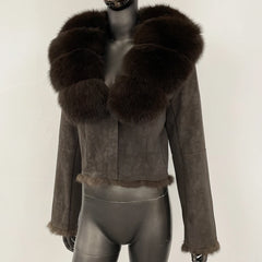 Cropped suede jacket with rich brown fur collar displayed front-facing on a mannequin against a neutral studio backdrop
