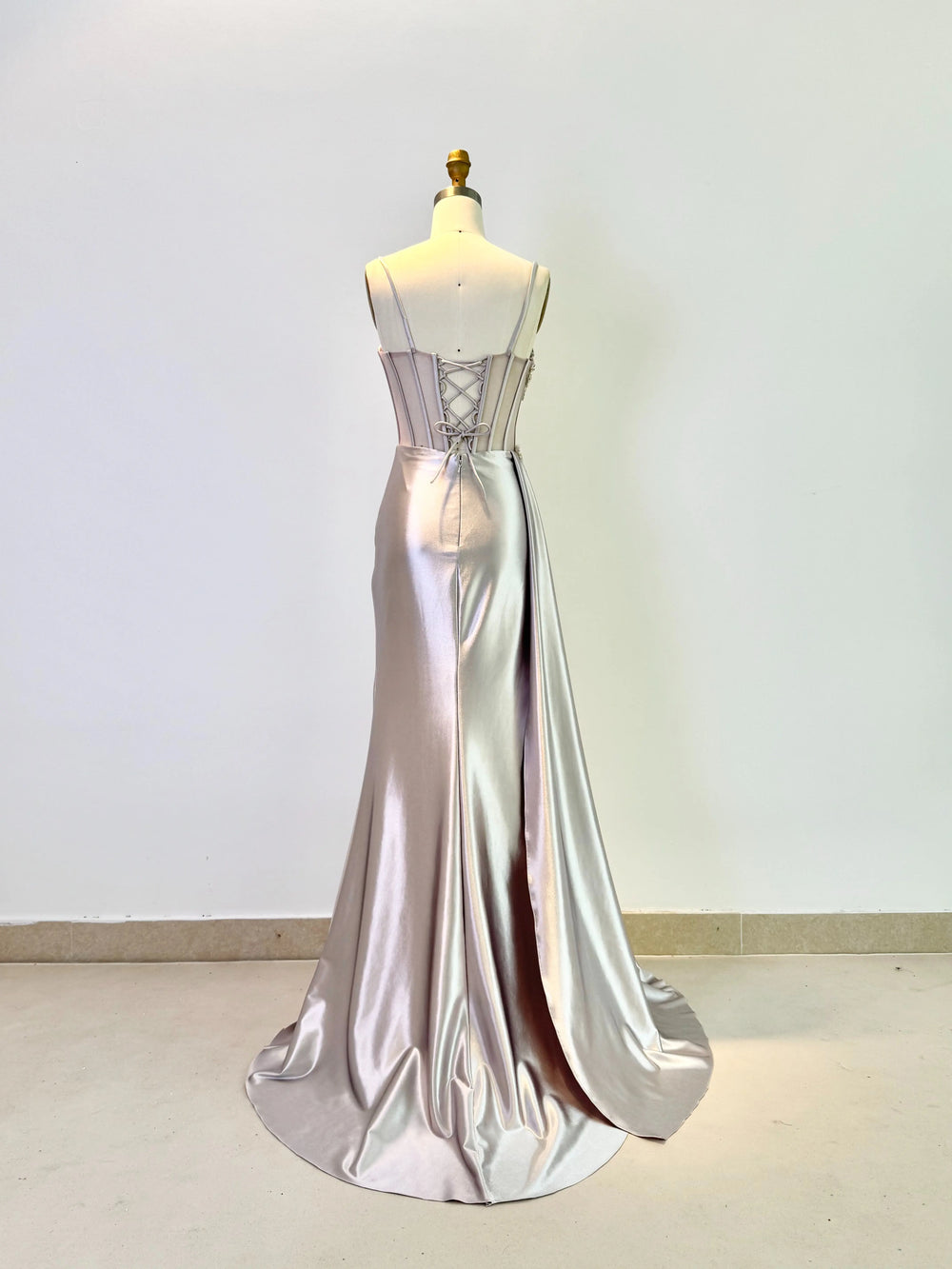 Pleated satin skirt with high side slit